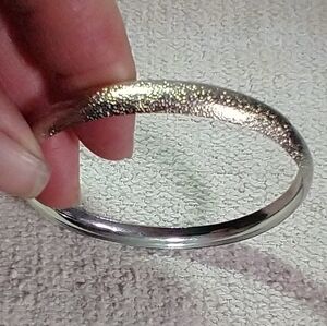 Silvertone textured bangle bracelet